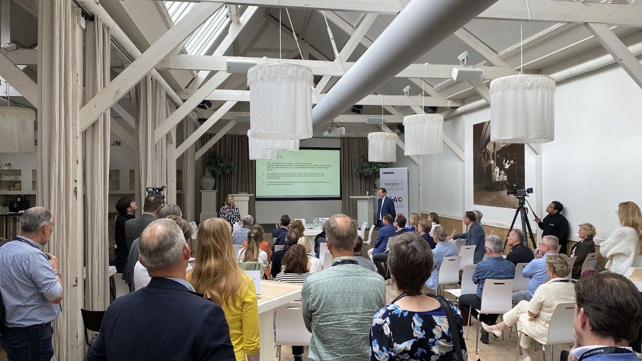 Blik in de zaal bij het evenement Netwerkzorg in de praktijk van D&A, Furore en Morgens